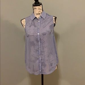 Blue and white striped sleeveless blouse.